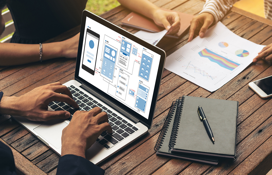 Calgary Web Design Services 3 web designer laying out design