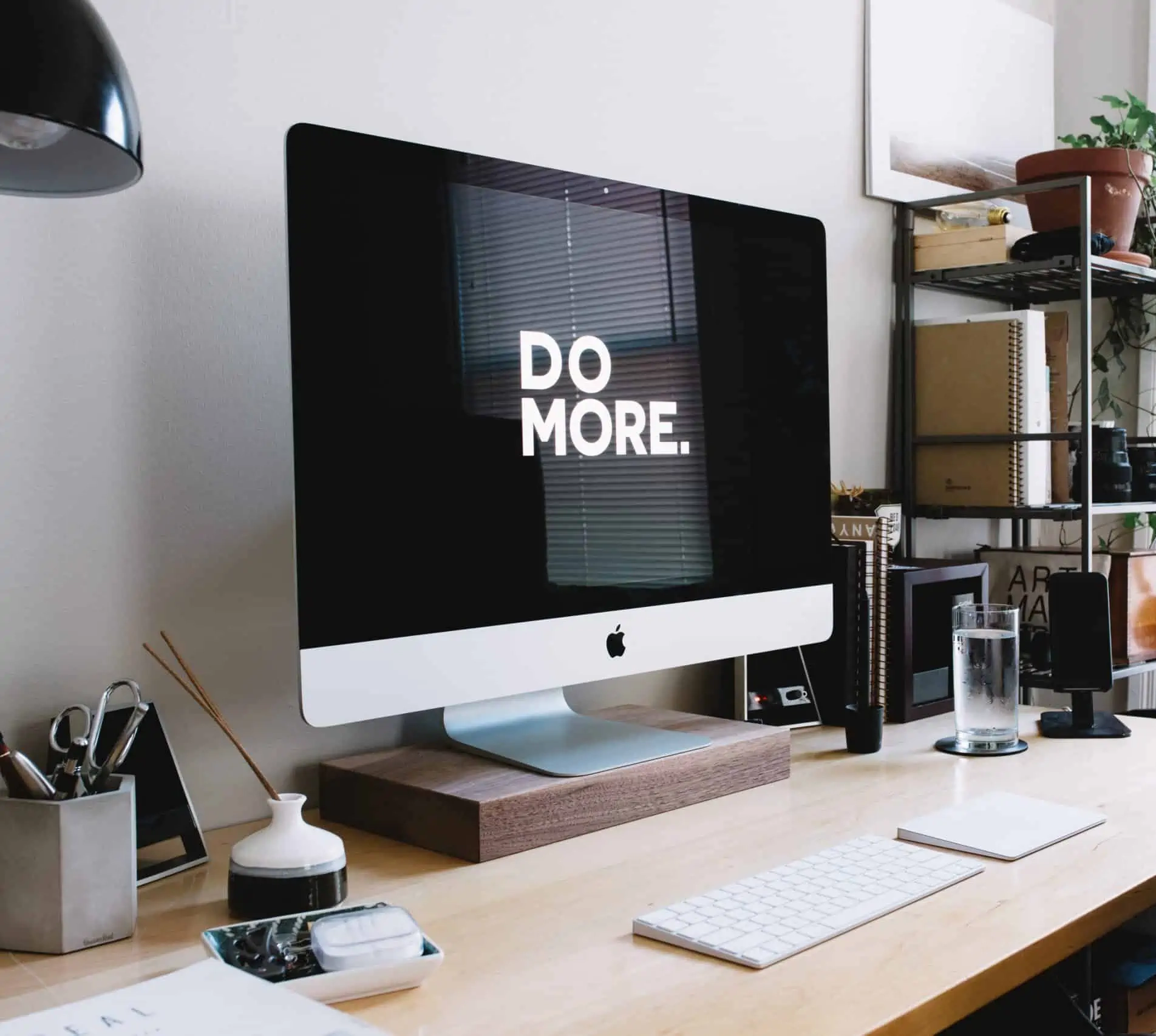 About our company 5 computer on desk saying do more