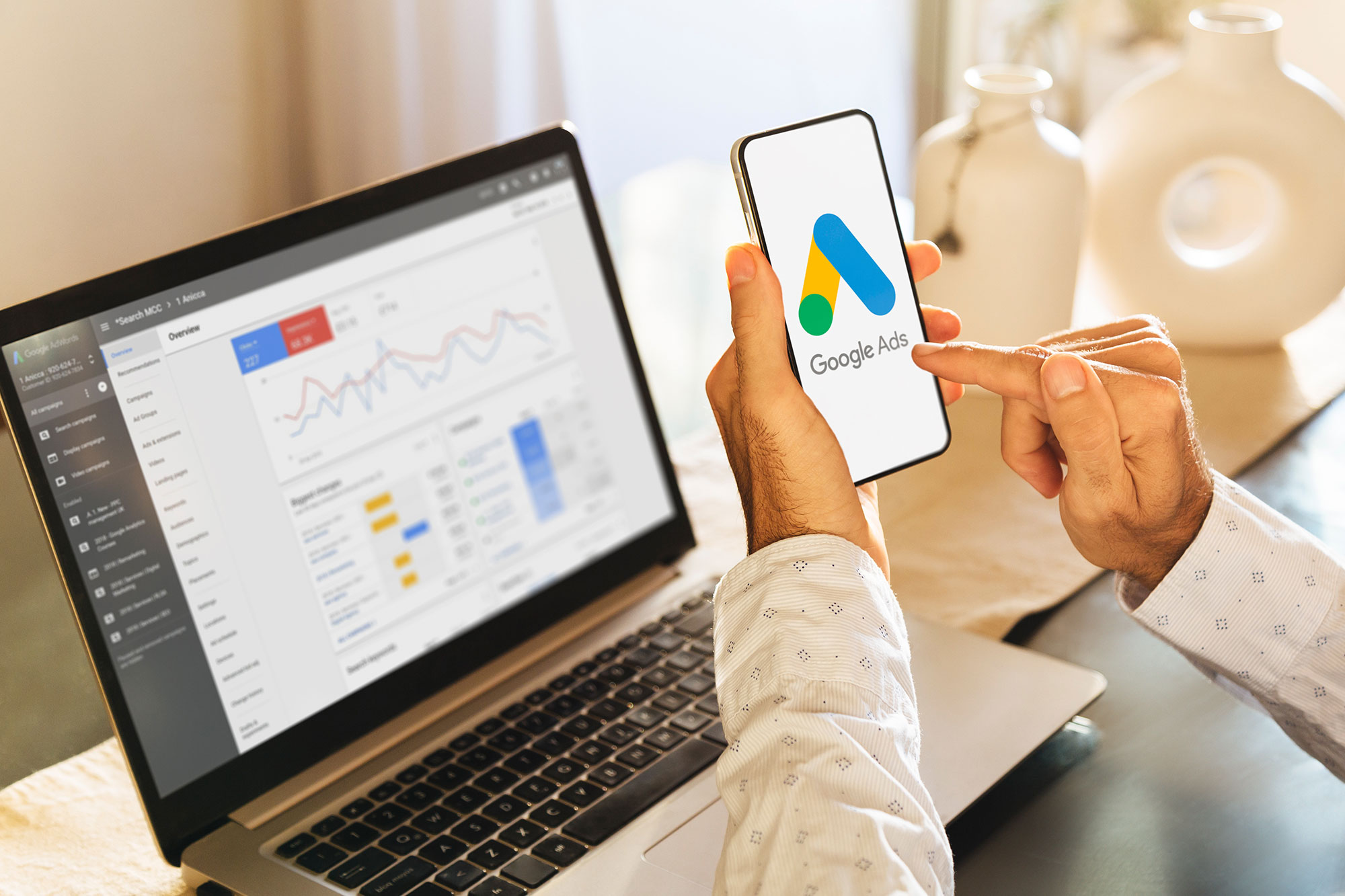 google ads management on laptop and phone